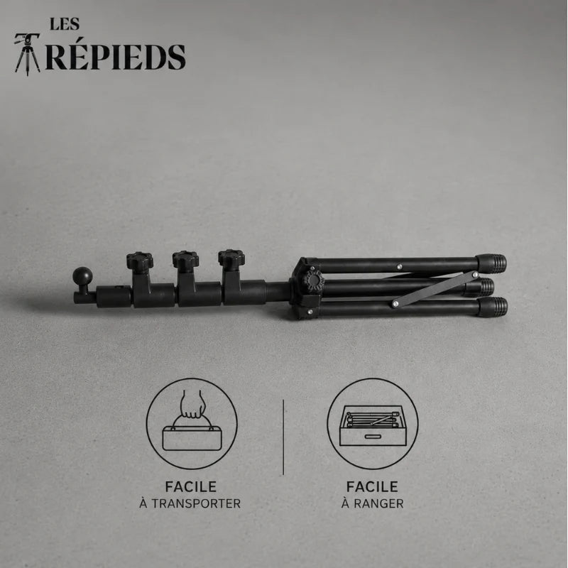 Trépied tablette noir replié à l'horizontale posé sur fond gris, logo Les Trépieds, avec les mentions facile à transporter et facile à ranger