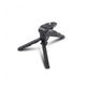 Mini trépied téléphone pliable noir 16 cm avec plaque de fixation en haut et trois pieds plats déployés en etoile, vue en angle sur fond blanc