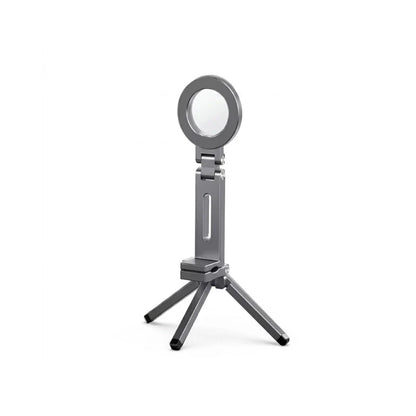 Mini trépied téléphone gris anthracite avec anneau magnétique circulaire en haut et quatre petits pieds noirs, sur fond blanc