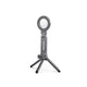 Mini trépied téléphone gris anthracite avec anneau magnétique circulaire en haut et quatre petits pieds noirs, sur fond blanc