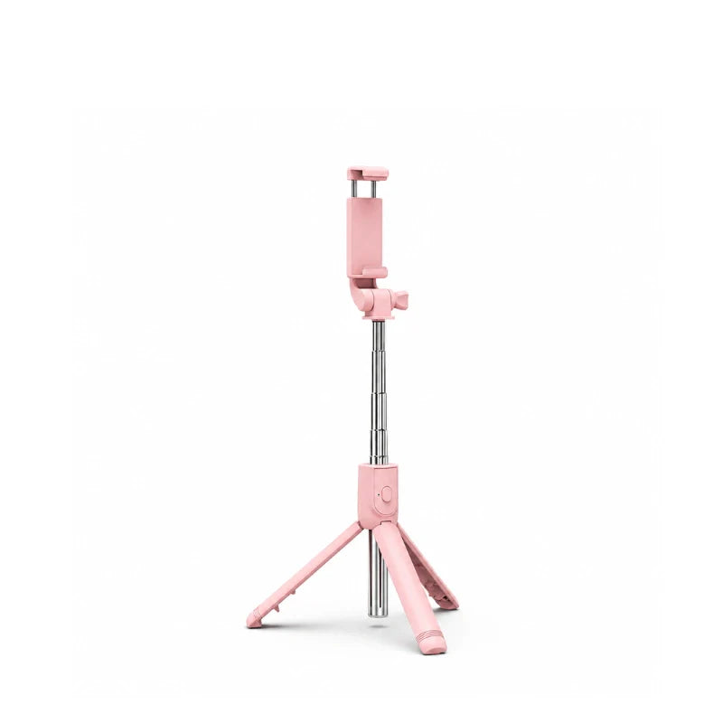 Mini trépied téléphone rose avec tige télescopique argentée, support pince en haut et trois pieds roses déployés, sur fond blanc