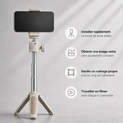 Mini trépied beige avec un smartphone noir fixé dans le support, posé sur surface grise, avec liste des avantages : installation rapide, image nette, cadrage propre, filmer sans fatigue