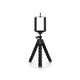 Mini trépied flexible noir avec jambes articulees en mousse et support téléphone noir en haut, rotule à bille noire, sur fond blanc