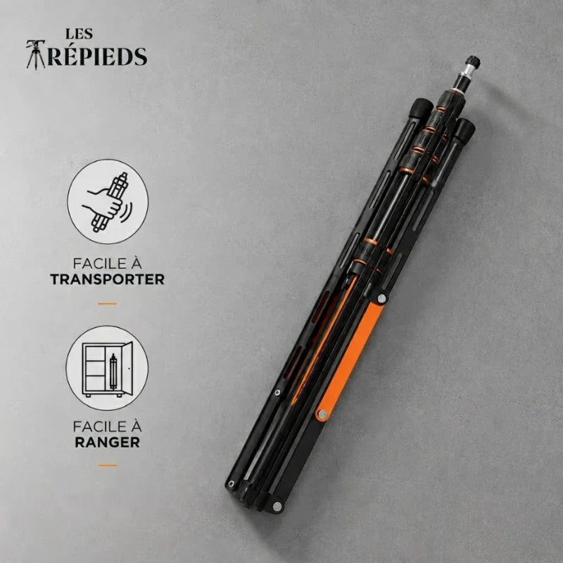 Trépied lumiere noir et orange replié à plat sur fond gris beton - logo Les Trépieds, facile a transporter et ranger